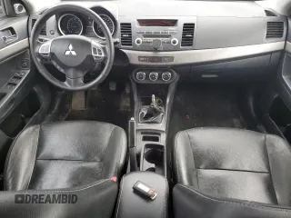 2012 Mitsubishi Lancer ES with VIN JA32U2FU7CU606426, listed as a Copart auction lot 52985355 with 261,158 mi miles and Salvage Title. Bid and sale history available at DreamBid. Image 8.