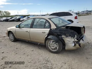 1999 Saturn SL с VIN 1G8ZK5278XZ269792, выставлен на аукционе Copart как лот 48773395 с пробегом 159 506 миль миль и Списание • Salvage title. История ставок и продаж доступна на DreamBid. Изображение 2.