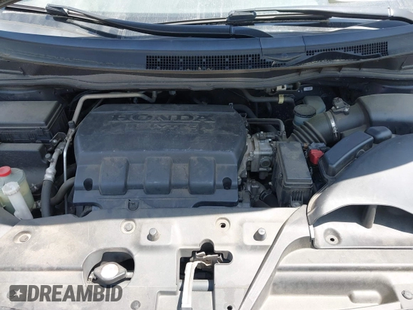 2014 Honda Odyssey EX-L with VIN 5FNRL5H66EB062158, listed as a IAAI auction lot 42072020 with 211,278 mi miles and . Bid and sale history available at carsss.com. Image 10.