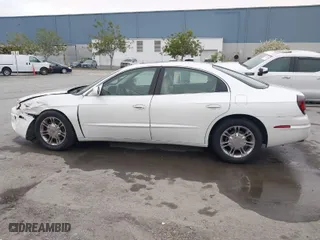 2001 Oldsmobile Aurora with VIN 1G3GS64C114109142, listed as a IAAI auction lot 41974652 with 81,395 mi miles. Bid and sale history available at carsss.com. Image 14.