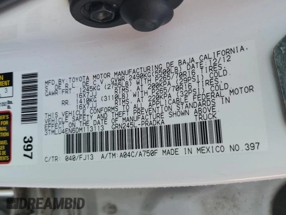 2013 Toyota Tacoma with VIN 3TMLU4EN6DM113113, listed as a Copart auction lot 58121785 with 131,058 mi miles and Salvage title. Bid and sale history available at DreamBid. Image 12.