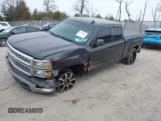 2015 Chevrolet Silverado 1500 LT with VIN 1GCVKREC5FZ224506, listed as a IAAI auction lot 41780803 with 104,960 mi miles and . Bid and sale history available at DreamBid. Image 2.