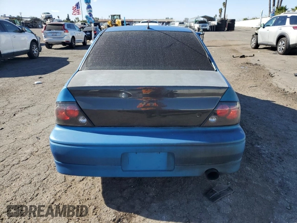 2002 Mitsubishi Lancer OZ-Rally z VIN JA3AJ86E62U070034, wystawiony jako Copart lot #86914144 z przebiegiem 180 675 mil mil oraz Szkoda całkowita • Salvage title. Historia ofert i sprzedaży dostępna na DreamBid. Obrazek 6.