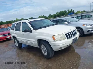 2002 Jeep Grand Cherokee Limited with VIN 1J4GW58N32C230685, listed as a IAAI auction lot 42692763 with 128,895 mi miles and . Bid and sale history available at DreamBid. Image 1.