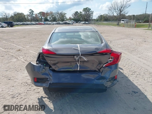 2017 Honda Civic LX with VIN 19XFC2F51HE036153, listed as a IAAI auction lot 41546498 with 78,726 mi miles and . Bid and sale history available at DreamBid. Image 6.