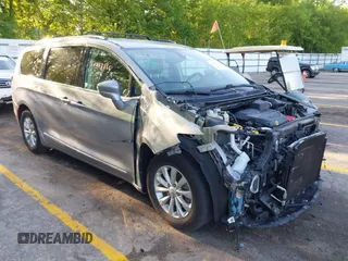 2019 Chrysler Pacifica Touring L with VIN 2C4RC1BG1KR665917, listed as a IAAI auction lot 42217866 with 105,965 mi miles and . Bid and sale history available at DreamBid. Image 1.