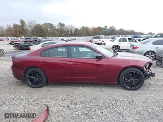 2017 Dodge Charger SE with VIN 2C3CDXBGXHH612156, listed as a IAAI auction lot 41028308 with 123,438 mi miles. Bid and sale history available at carsss.com. Image 14.
