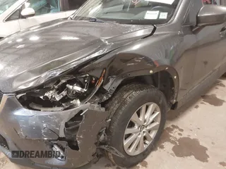 2015 Mazda CX-5 Touring with VIN JM3KE4CY3F0460501, listed as a IAAI auction lot 41889743 with 160,367 mi miles. Bid and sale history available at carsss.com. Image 6.