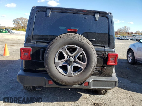 2023 Jeep Wrangler Sport with VIN 1C4HJXDN9PW512460, listed as a Copart auction lot 77107894 with 23,142 mi miles and Salvage Title. Bid and sale history available at DreamBid. Image 6.