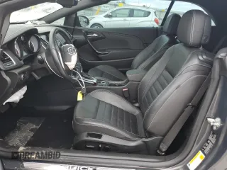 2016 Buick Cascada Premium с VIN W04WT3N53GG112343, выставлен на аукционе Copart как лот 62080574 с пробегом 24 000 миль миль и Списание • Salvage title. История ставок и продаж доступна на DreamBid. Изображение 7.