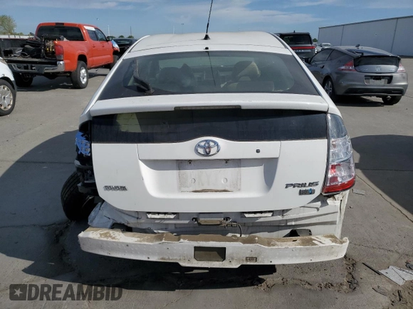 2004 Toyota Prius with VIN JTDKB20U340078473, listed as a Copart auction lot 52633955 with 146,932 mi miles and Salvage Title. Bid and sale history available at DreamBid. Image 6.