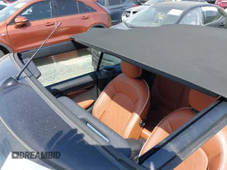 2021 MINI Convertible with VIN WMWWJ9C0XM3M07302, listed as a IAAI auction lot 42027854 with 30,921 mi miles and . Bid and sale history available at DreamBid. Image 19.