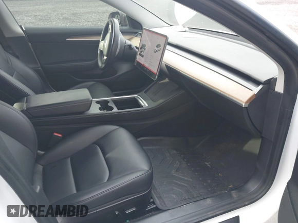 2021 Tesla Model 3 Long Range with VIN 5YJ3E1EB8MF974007, listed as a IAAI auction lot 41915513 with 107,354 mi miles and . Bid and sale history available at carsss.com. Image 5.