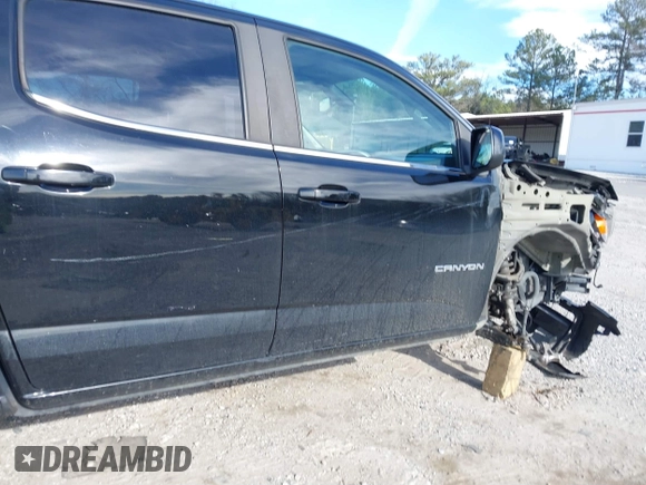 2018 GMC Canyon 2WD SLE with VIN 1GTG5CEN0J1309260, listed as a IAAI auction lot 41645904 with 144,011 mi miles. Bid and sale history available at carsss.com. Image 6.