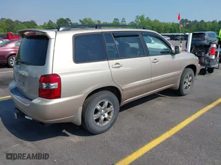 2006 Toyota Highlander with VIN JTEGP21A260095615, listed as a IAAI auction lot 41979567 with 122,904 mi miles. Bid and sale history available at carsss.com. Image 4.