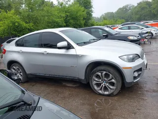 2012 BMW X6 50i z VIN 5UXFG8C58CL590171, wystawiony jako IAAI lot #42357805 z przebiegiem 83 144 mil mil oraz . Historia ofert i sprzedaży dostępna na DreamBid. Obrazek 14.