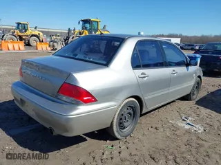 2002 Mitsubishi Lancer ES with VIN JA3AJ26E52U022764, listed as a IAAI auction lot 41763763 with 120,493 mi miles. Bid and sale history available at carsss.com. Image 4.