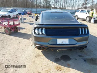 2018 Ford Mustang GT z VIN 1FA6P8CF4J5158775, wystawiony jako IAAI lot #41627780 z przebiegiem 65 519 mil mil oraz . Historia ofert i sprzedaży dostępna na DreamBid. Obrazek 16.