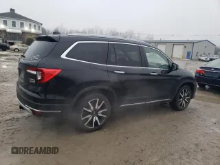 2020 Honda Pilot Touring 7-Passenger z VIN 5FNYF6H67LB003593, wystawiony jako Copart lot #83658334 z przebiegiem 105 575 mil mil oraz Szkoda całkowita • Salvage title. Historia ofert i sprzedaży dostępna na DreamBid. Obrazek 3.