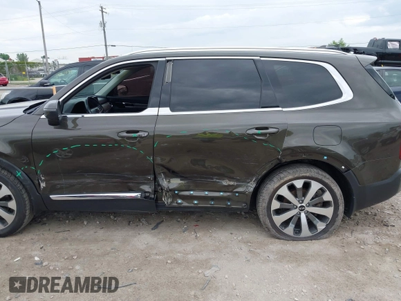 2020 Kia Telluride EX z VIN 5XYP3DHC6LG091463, wystawiony jako IAAI lot #42530329 z przebiegiem 69 824 mil mil oraz . Historia ofert i sprzedaży dostępna na DreamBid. Obrazek 14.