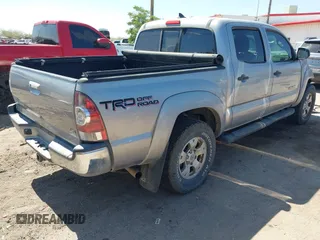 2015 Toyota Tacoma with VIN 3TMLU4EN6FM188736, listed as a IAAI auction lot 42605859 with 210,717 mi miles and . Bid and sale history available at DreamBid. Image 4.
