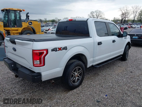 2016 Ford F-150 XLT with VIN 1FTEW1E84GKE18228, listed as a IAAI auction lot 41883297 with 147,018 mi miles. Bid and sale history available at carsss.com. Image 4.