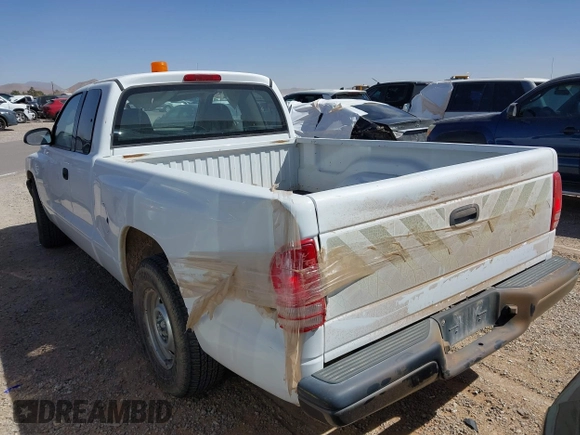 2002 Dodge Dakota with VIN 1B7GL12X32S701273, listed as a IAAI auction lot 41552573 with 157,212 mi miles and . Bid and sale history available at carsss.com. Image 13.