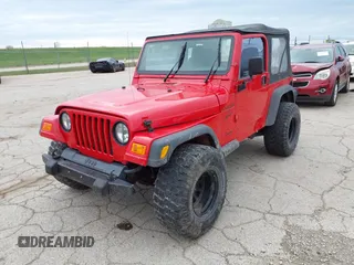 2000 Jeep Wrangler Sport with VIN 1J4FA49S7YP713672, listed as a IAAI auction lot 41924814 with 172,688 mi miles. Bid and sale history available at carsss.com. Image 2.
