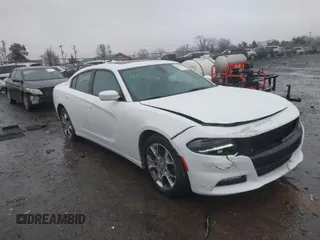 2015 Dodge Charger SXT with VIN 2C3CDXJG3FH746506, listed as a IAAI auction lot 41463713 with 130,687 mi miles. Bid and sale history available at carsss.com. Image 1.