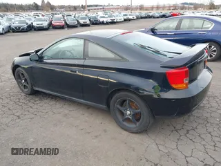 2000 Toyota Celica GTS with VIN JTDDY38T8Y0019336, listed as a IAAI auction lot 41643174 with 217,926 mi miles. Bid and sale history available at carsss.com. Image 3.