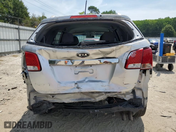 2013 Kia Sorento LX with VIN 5XYKT4A20DG323200, listed as a Copart auction lot 61738005 with 205,312 mi miles and Salvage title. Bid and sale history available at DreamBid. Image 6.