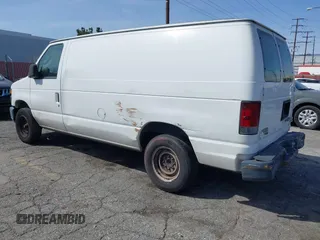 2012 Ford Econoline Cargo Commercial with VIN 1FTNE1EW2CDB17070, listed as a IAAI auction lot 41847884 with 249,165 mi miles and . Bid and sale history available at carsss.com. Image 3.