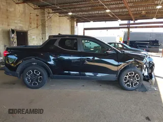 2022 Hyundai Santa Cruz SEL z VIN 5NTJCDAE7NH018858, wystawiony jako IAAI lot #42038182 z przebiegiem 28 596 mil mil oraz . Historia ofert i sprzedaży dostępna na DreamBid. Obrazek 14.