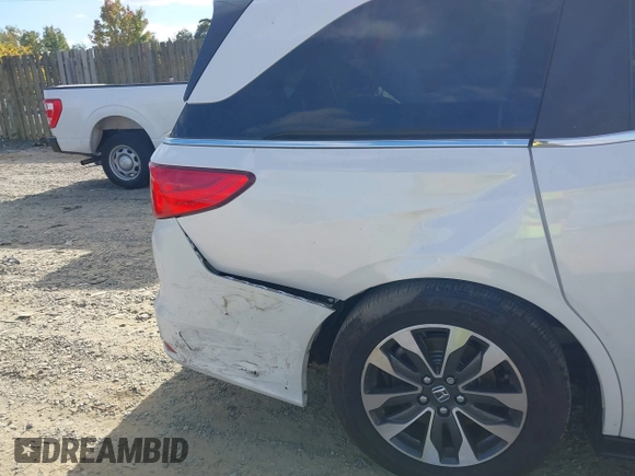 2024 Honda Odyssey EX-L with VIN 5FNRL6H65RB007535, listed as a IAAI auction lot 40602982 with 6,097 mi miles and . Bid and sale history available at DreamBid. Image 6.