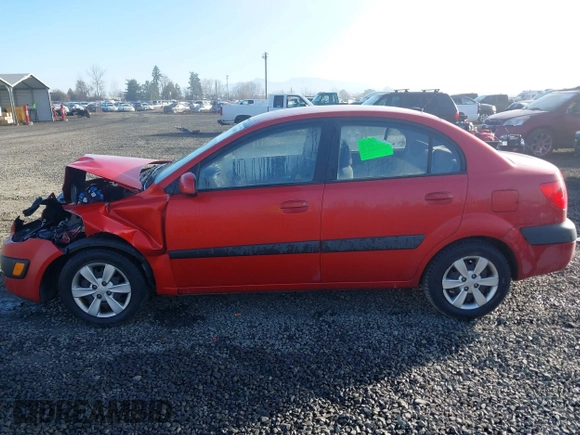 2009 Kia Rio LX with VIN KNADE223796485606, listed as a IAAI auction lot 41676881 with 58,852 mi miles and . Bid and sale history available at DreamBid. Image 14.
