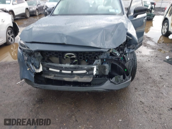 2024 Mazda CX-5 S Carbon Edition z VIN JM3KFBCL1R0470051, wystawiony jako IAAI lot #42088186 z przebiegiem 10 285 mil mil oraz . Historia ofert i sprzedaży dostępna na DreamBid. Obrazek 6.