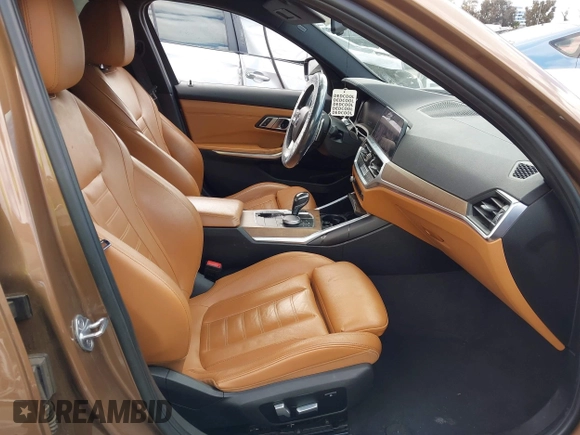 2019 BMW 3 Series 330i with VIN WBA5R1C57KAK07519, listed as a IAAI auction lot 42042379 with 40,898 mi miles and . Bid and sale history available at DreamBid. Image 5.