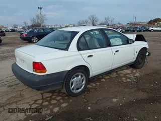 1999 Saturn SL with VIN 1G8ZG5283XZ329617, listed as a IAAI auction lot 41124118 with 195,249 mi miles and . Bid and sale history available at DreamBid. Image 4.