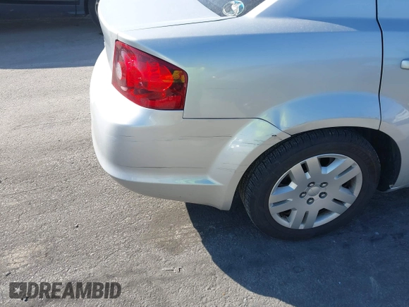 2012 Dodge Avenger SE with VIN 1C3CDZAB3CN147155, listed as a IAAI auction lot 41762561 with 117,955 mi miles. Bid and sale history available at carsss.com. Image 6.