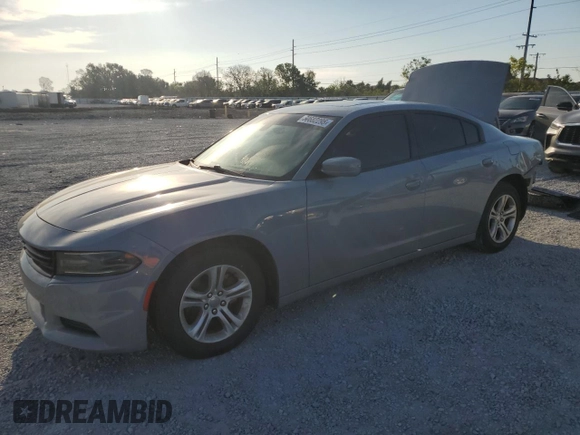 2021 Dodge Charger SXT with VIN 2C3CDXBG6MH518284, listed as a Copart auction lot 50682295 with 89,674 mi miles and Salvage Title. Bid and sale history available at carsss.com. Image 1.