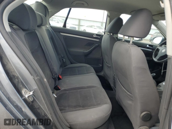 2009 Volkswagen Jetta S with VIN 3VWJM71K59M007776, listed as a Copart auction lot 53959525 with 190,557 mi miles and Salvage title. Bid and sale history available at DreamBid. Image 10.