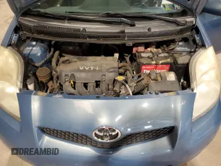 2010 Toyota Yaris z VIN JTDJT4K39A5292522, wystawiony jako Copart lot #58588655 z przebiegiem 115 909 mil mil oraz Szkoda całkowita • Salvage title. Historia ofert i sprzedaży dostępna na DreamBid. Obrazek 11.