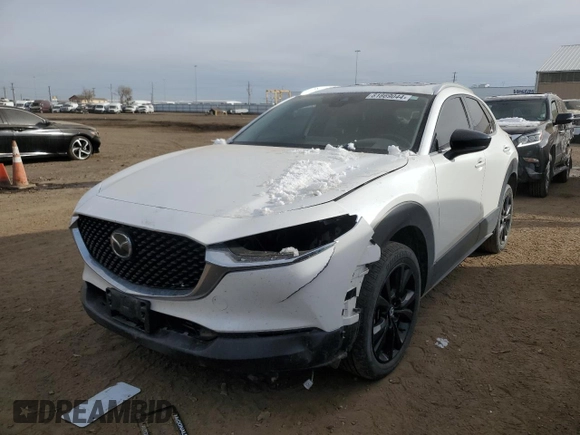 2021 Mazda CX-30 Premium with VIN 3MVDMBDY4MM308677, listed as a Copart auction lot 81869044 with 32,362 mi miles and Salvage Title. Bid and sale history available at carsss.com. Image 1.