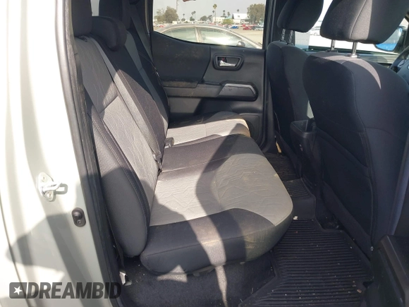 2022 Toyota Tacoma SR5 z VIN 3TMBZ5DN3NM034388, wystawiony jako IAAI lot #42270543 z przebiegiem 179 904 mil mil oraz . Historia ofert i sprzedaży dostępna na DreamBid. Obrazek 8.