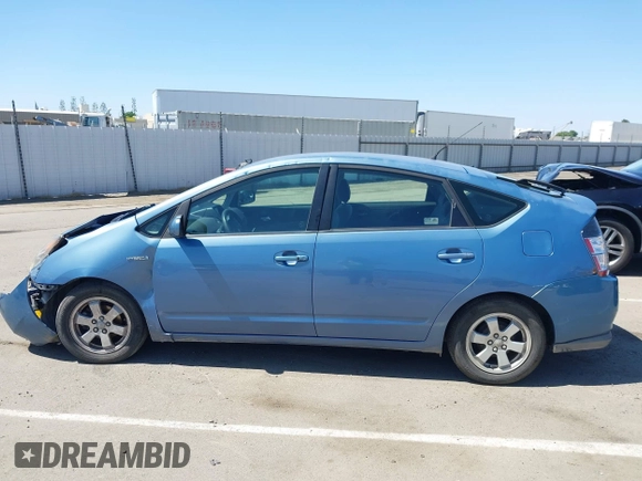 2009 Toyota Prius with VIN JTDKB20U297846412, listed as a IAAI auction lot 42189578 with 235,818 mi miles and . Bid and sale history available at DreamBid. Image 14.