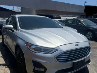 2019 Ford Fusion SE z VIN 3FA6P0HD0KR201807, wystawiony jako Copart lot #58443565 z przebiegiem 30 077 mil mil oraz Szkody całkowita. Historia ofert i sprzedaży dostępna na DreamBid. Obrazek 1.