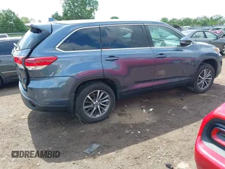 2019 Toyota Highlander SE with VIN 5TDJZRFH2KS975689, listed as a IAAI auction lot 42250723 with 88,043 mi miles and . Bid and sale history available at DreamBid. Image 4.