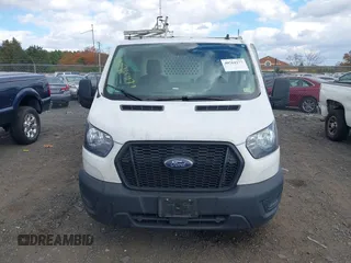 2022 Ford Transit Cargo with VIN 1FTBR1YG6NKA84259, listed as a IAAI auction lot 40764177 with 80,042 mi miles and . Bid and sale history available at DreamBid. Image 12.