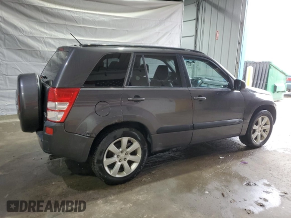 2012 Suzuki Grand Vitara Limited z VIN JS3TD0D76C4100949, wystawiony jako Copart lot #55834305 z przebiegiem 241 042 mil mil oraz Czysty tytuł • Clean title. Historia ofert i sprzedaży dostępna na DreamBid. Obrazek 3.
