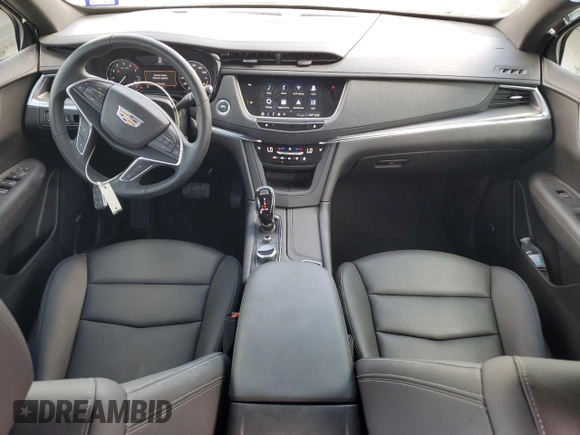 2024 Cadillac XT5 FWD Luxury with VIN 1GYKNAR42RZ731988, listed as a Copart auction lot 72777544 with 5,965 mi miles and Salvage title. Bid and sale history available at DreamBid. Image 8.